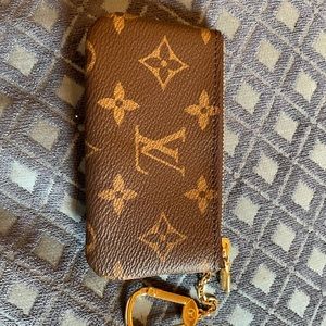 Louis Vuitton coin purse NEVER USED